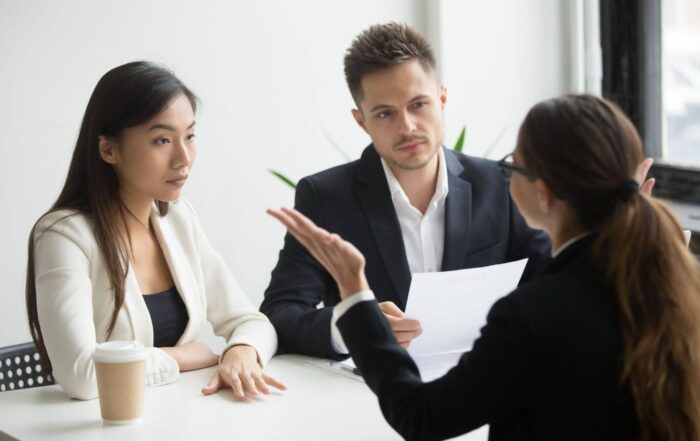 Michigan couple discussing divorce with attorney